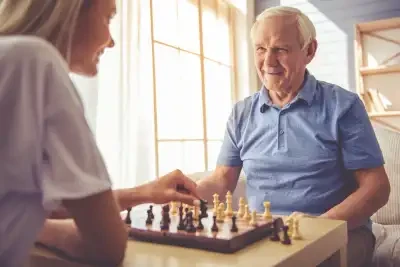 Community members playing chess together
